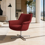 Pimento swivel armchair in red fabric upholstery with chrome swivel base in a contemporary living room