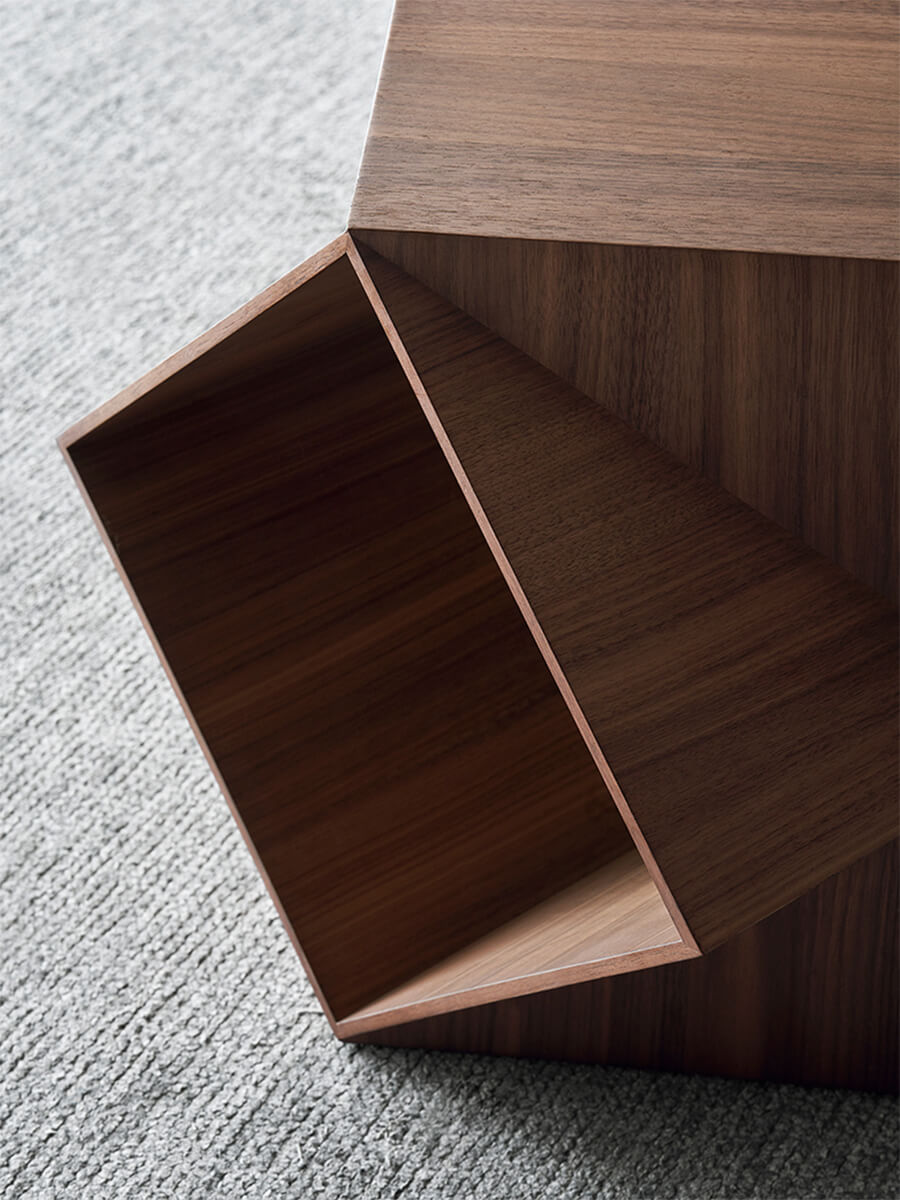 Open geometric storage compartment of the Prism Sculptural Side Table in walnut finish