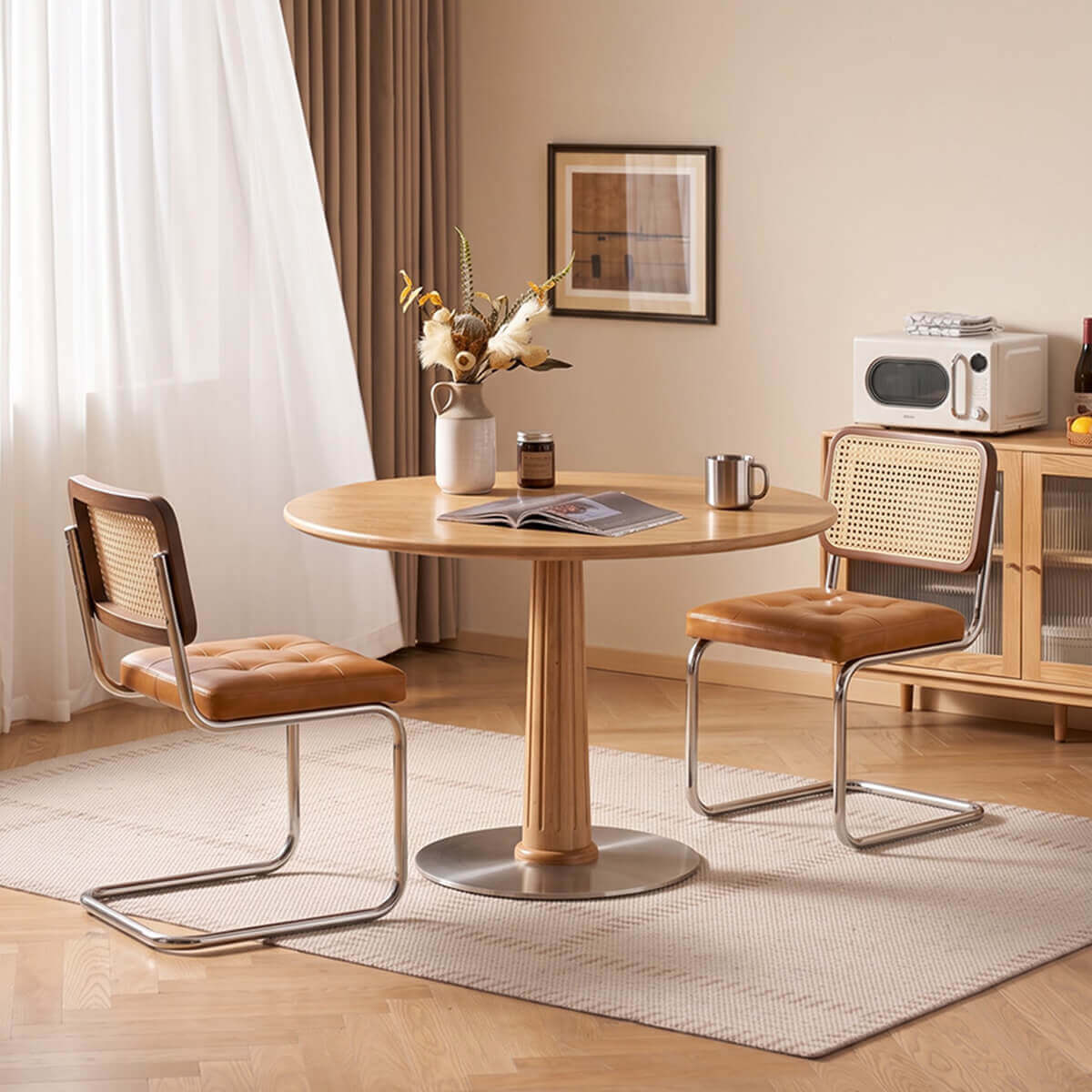 Riva Solid Oak Round Dining Table in a contemporary dining room