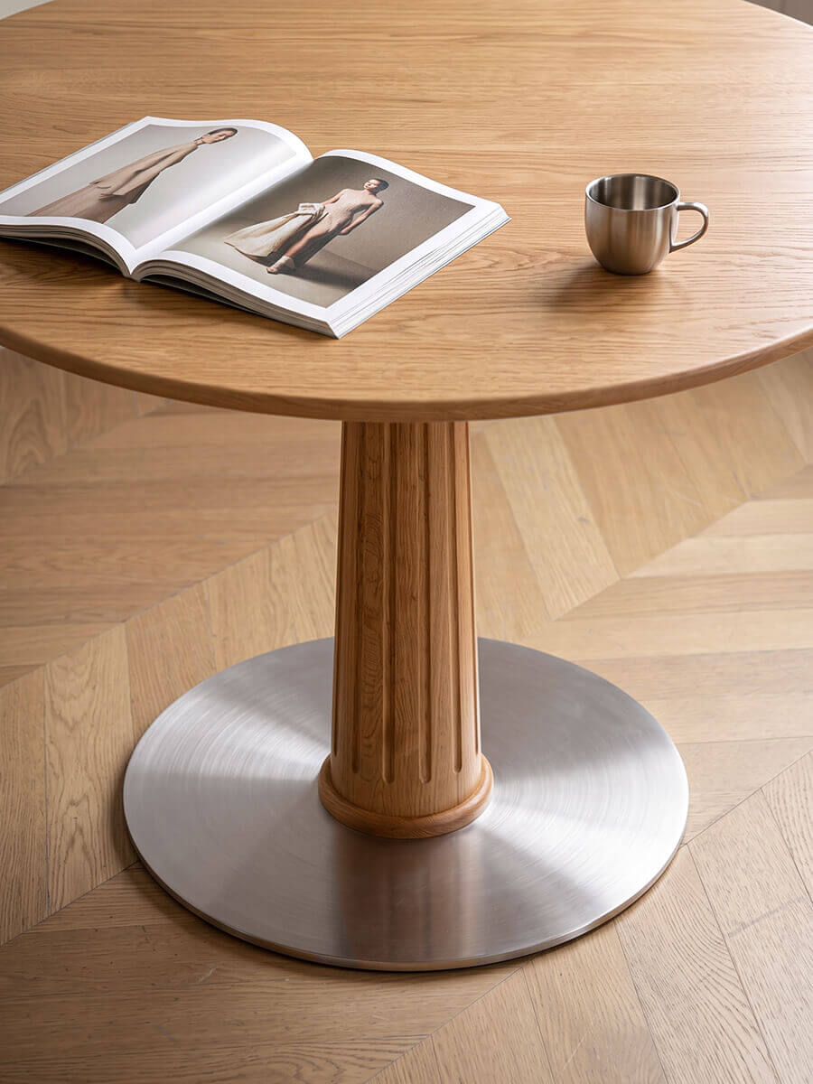 Riva dining table fluted solid oak pedestal and brushed stainless steel base