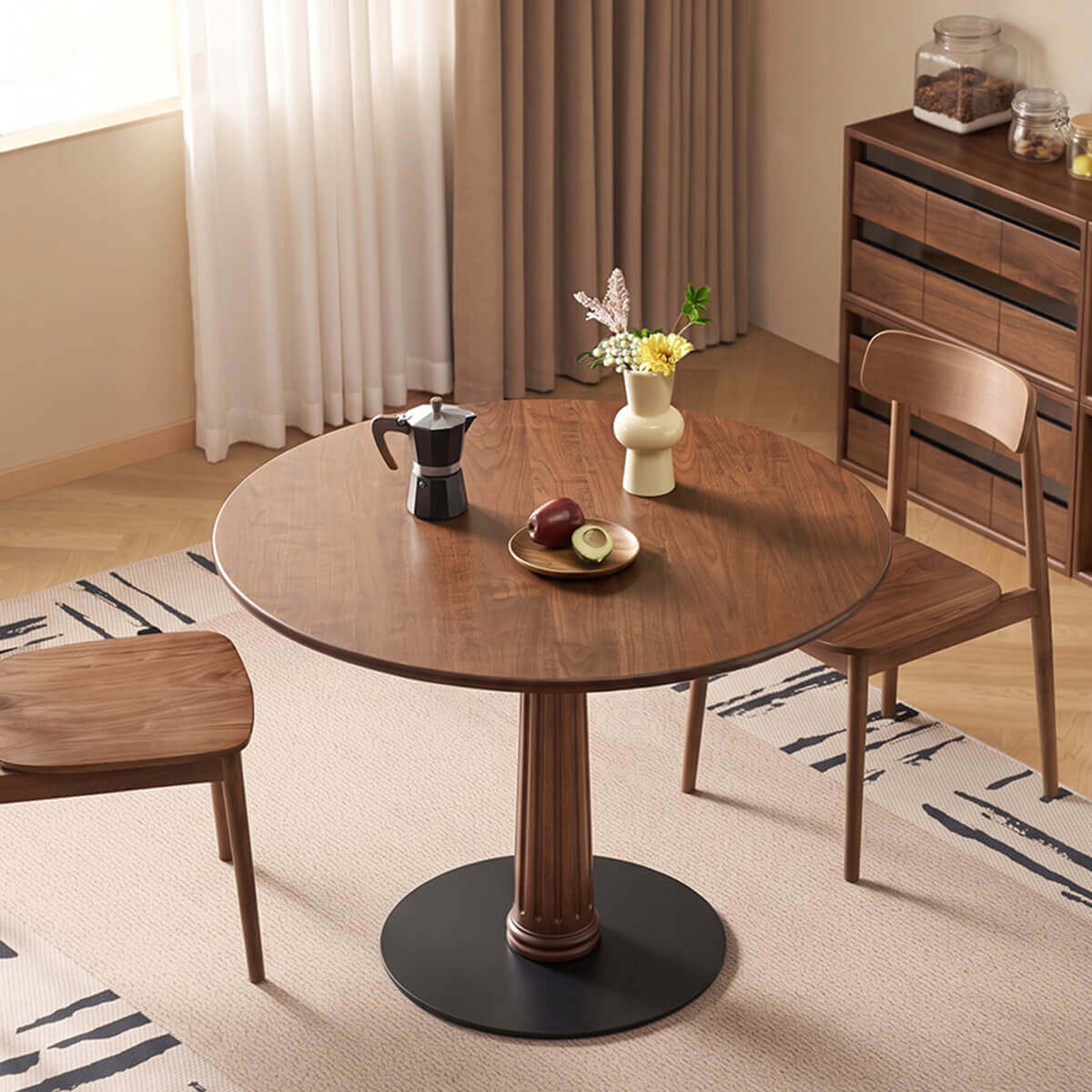 Riva Solid Walnut Round Dining Table in a compact dining setting