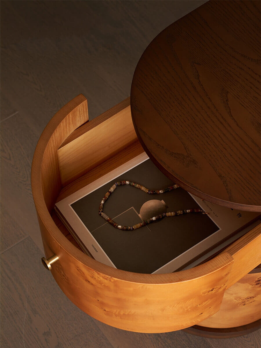 Curved drawer storage inside the Sable bedside table