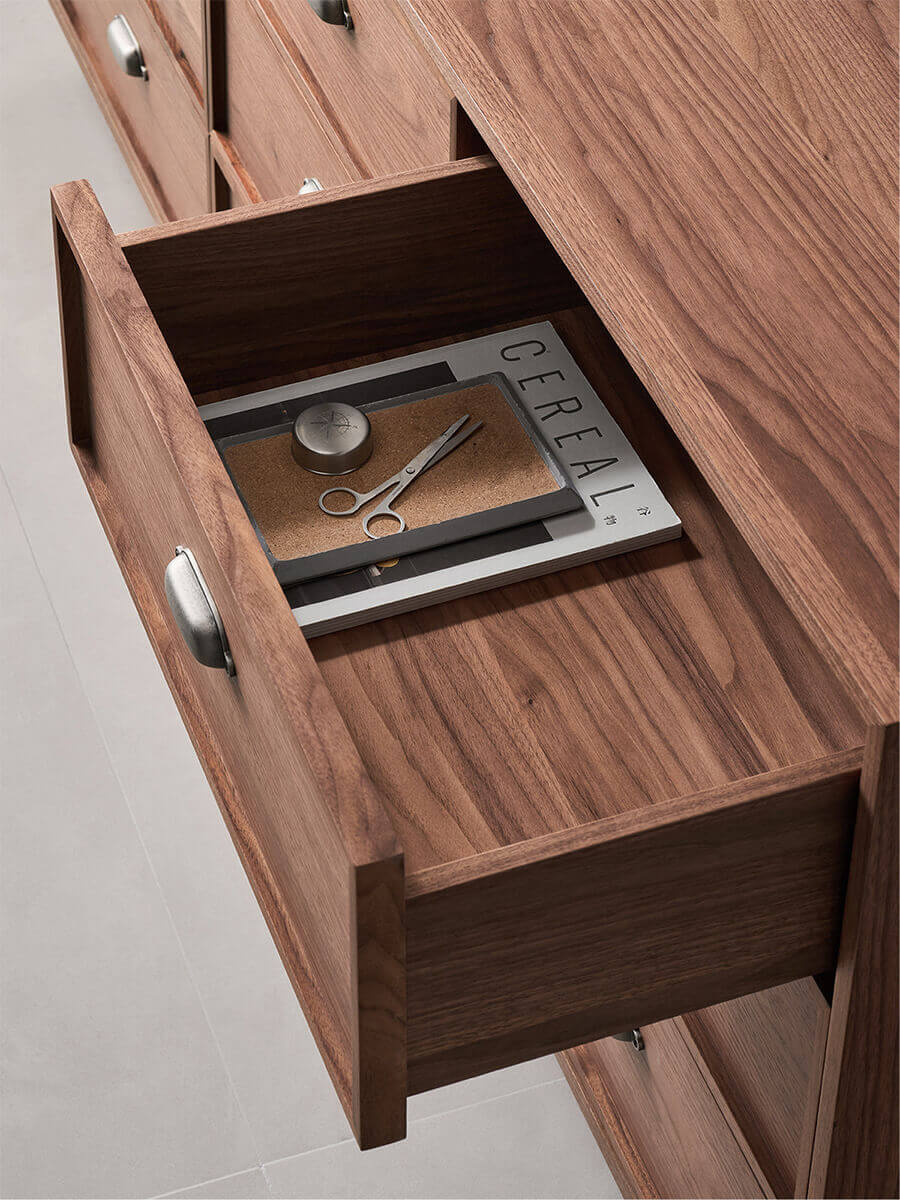 Close-up of spacious drawer storage in the Sala Walnut Chest of Drawers
