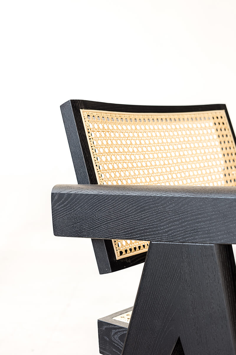Solid ash wood armrest detail on Sandy dining chair