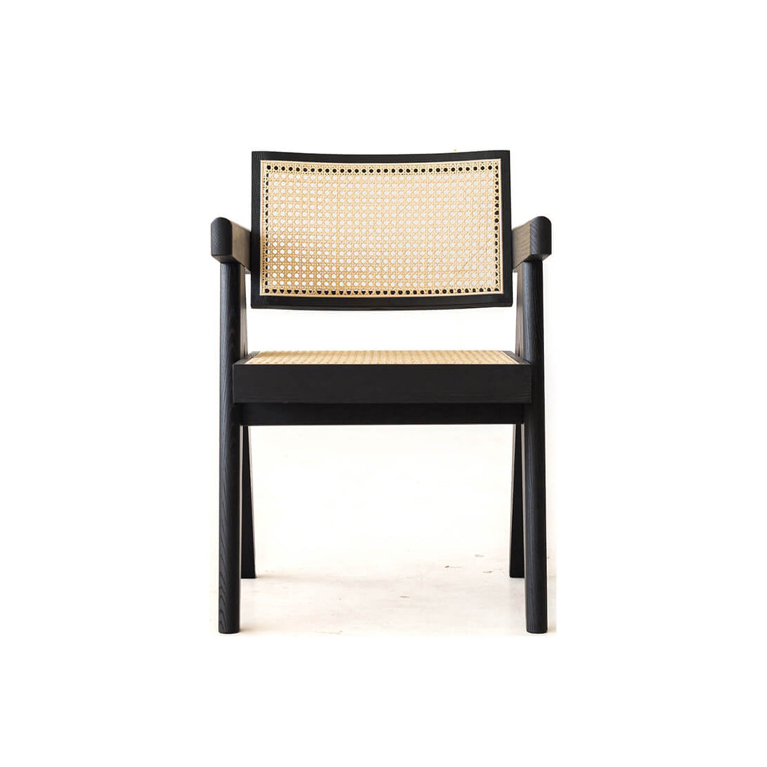 Front view of Sandy dining chair with woven rattan backrest