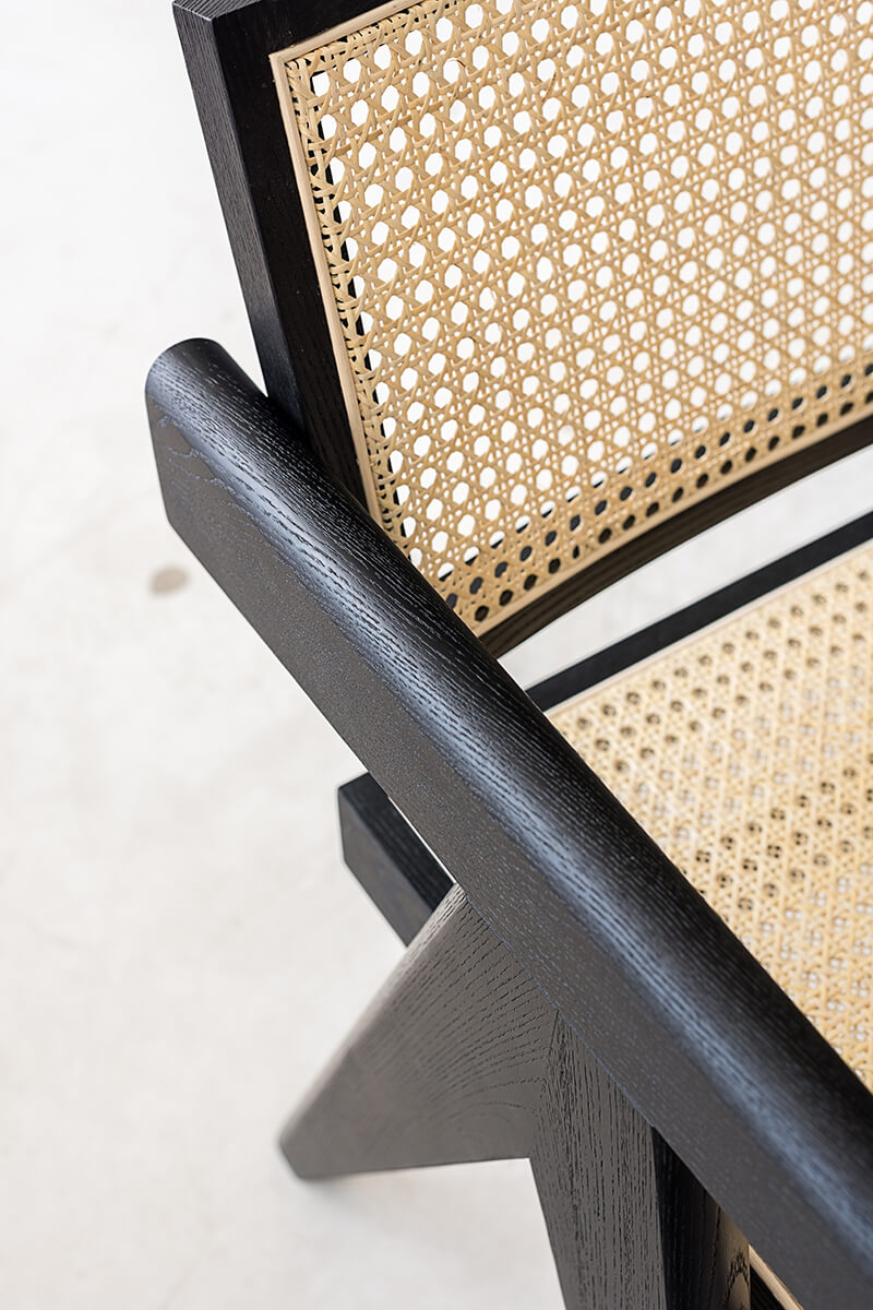 Handwoven rattan detail on Sandy dining chair