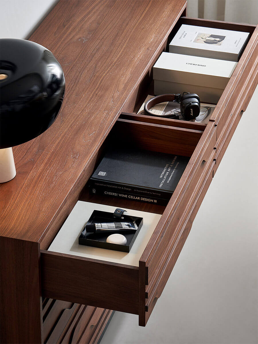 Close-up of the soft-close drawer of the Siena Walnut Chest of Drawers