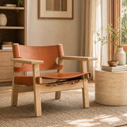Spanish armchair replica in warm contemporary living room
