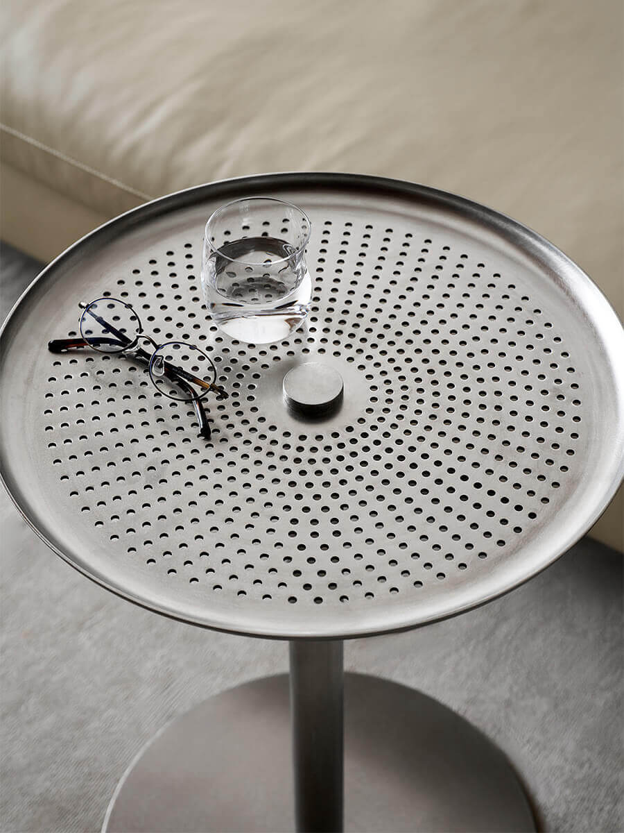 Sterling side table perforated stainless steel tabletop detail
