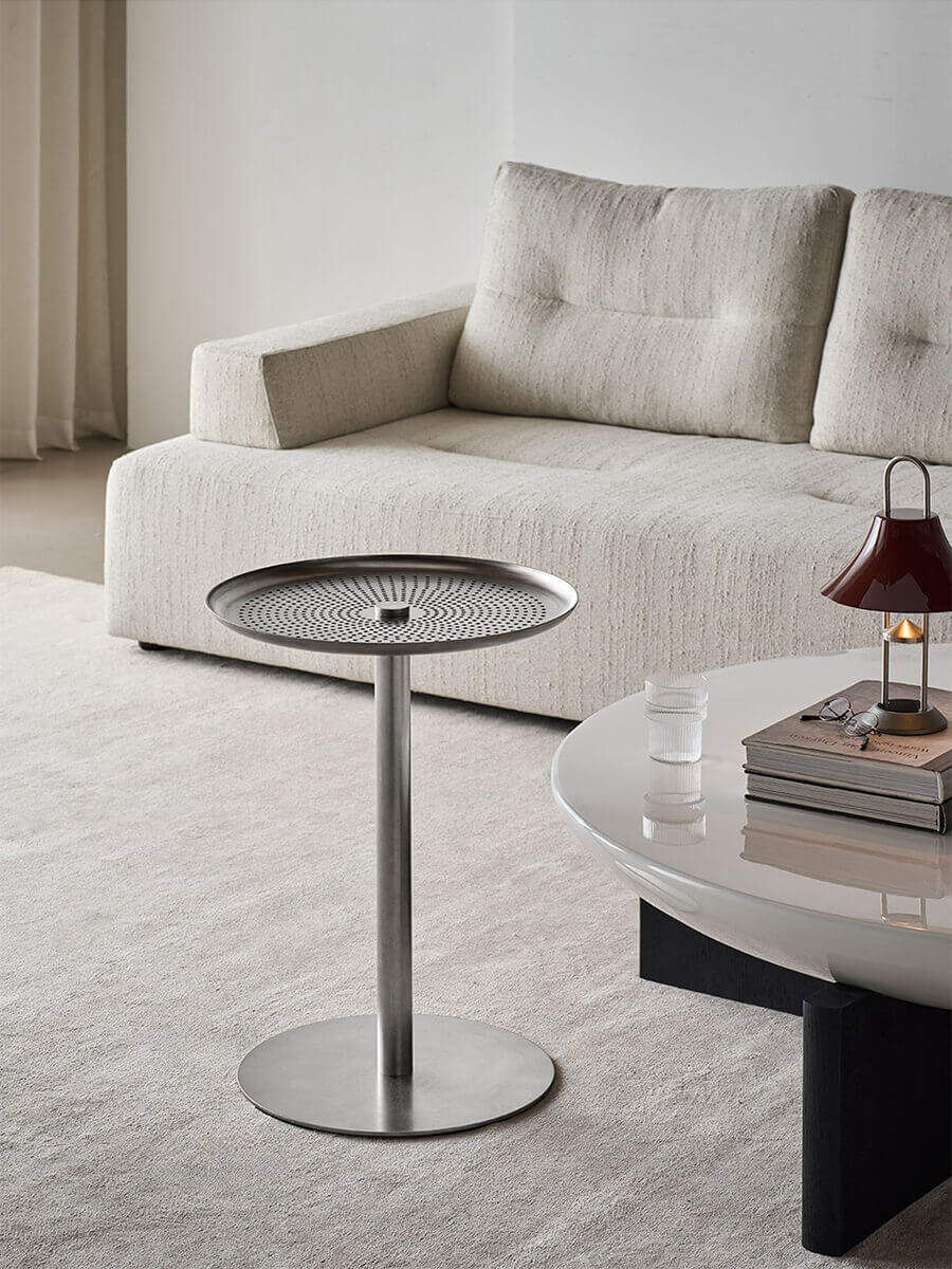 Sterling stainless steel occasional table in a living room