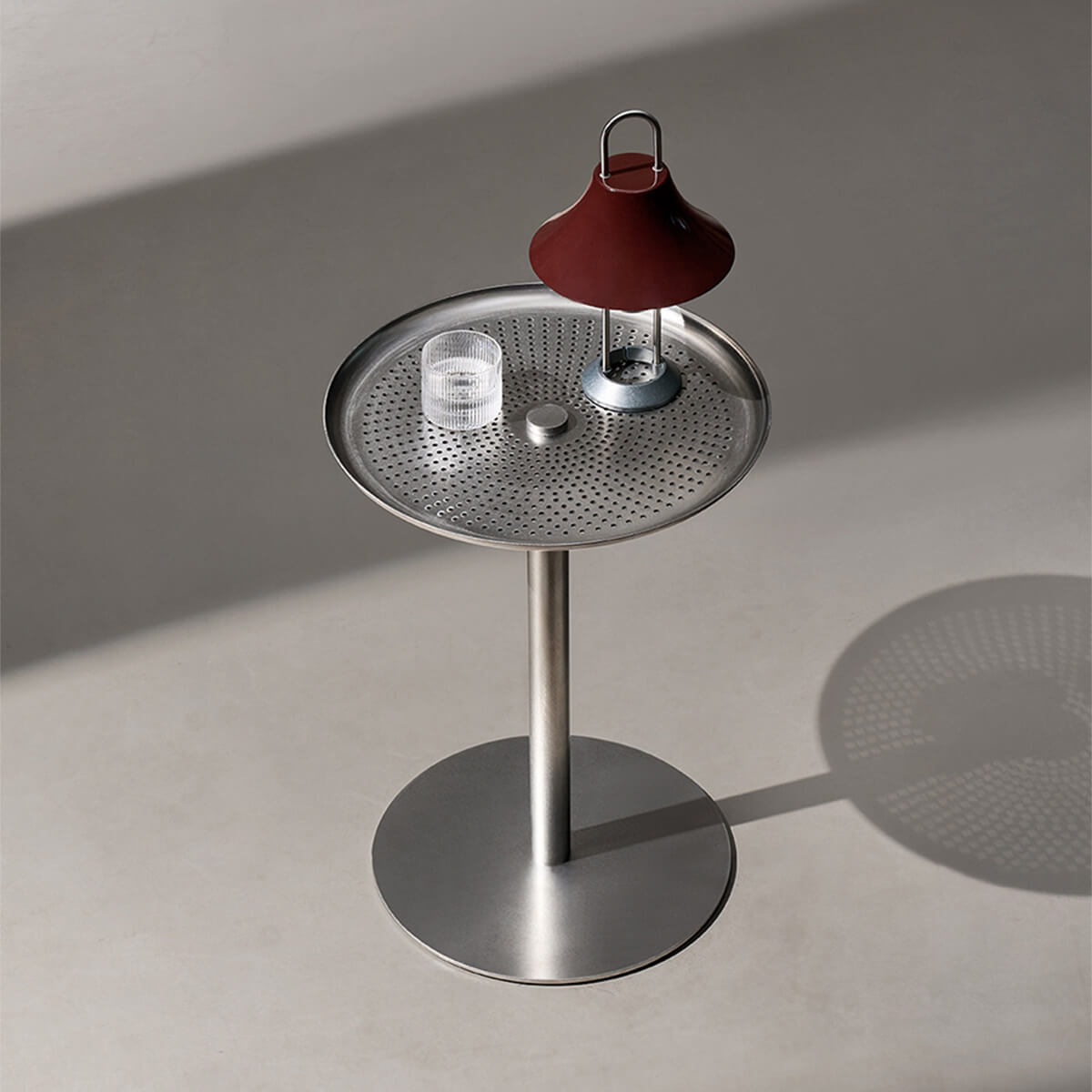 Sterling stainless steel side table with perforated top and brushed finish