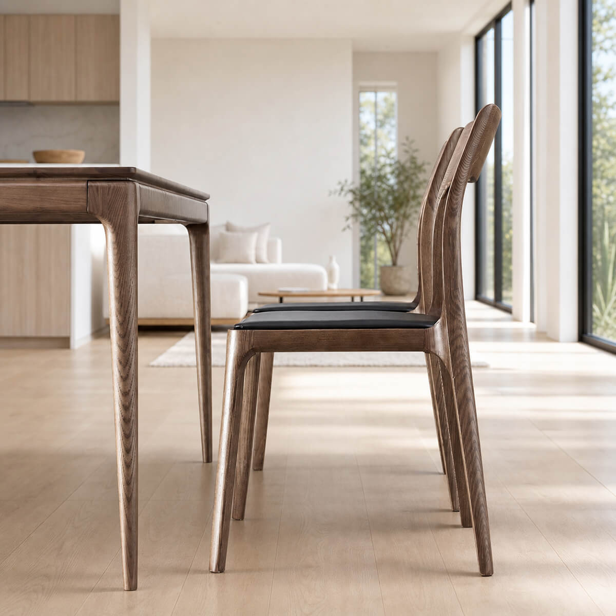 Side view of Stockholm dining table in walnut finish