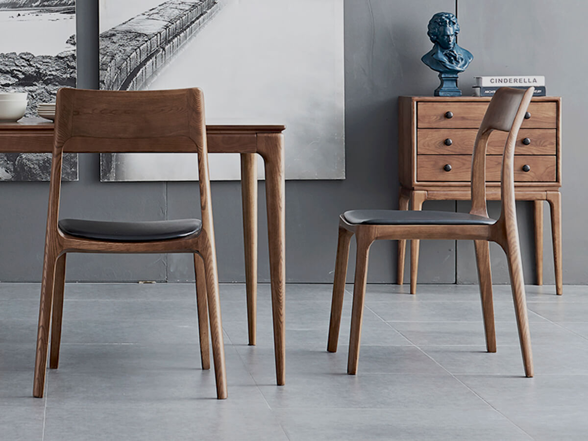 Side view of Stockholm dining table in walnut finish