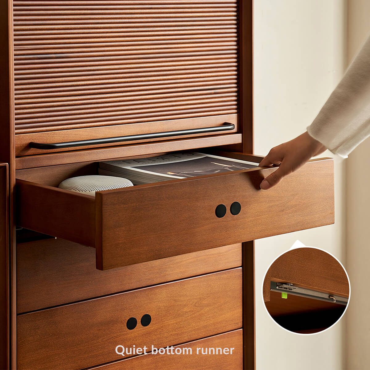 Open Tambour cabinet drawer showing the quiet bottom-mounted runner