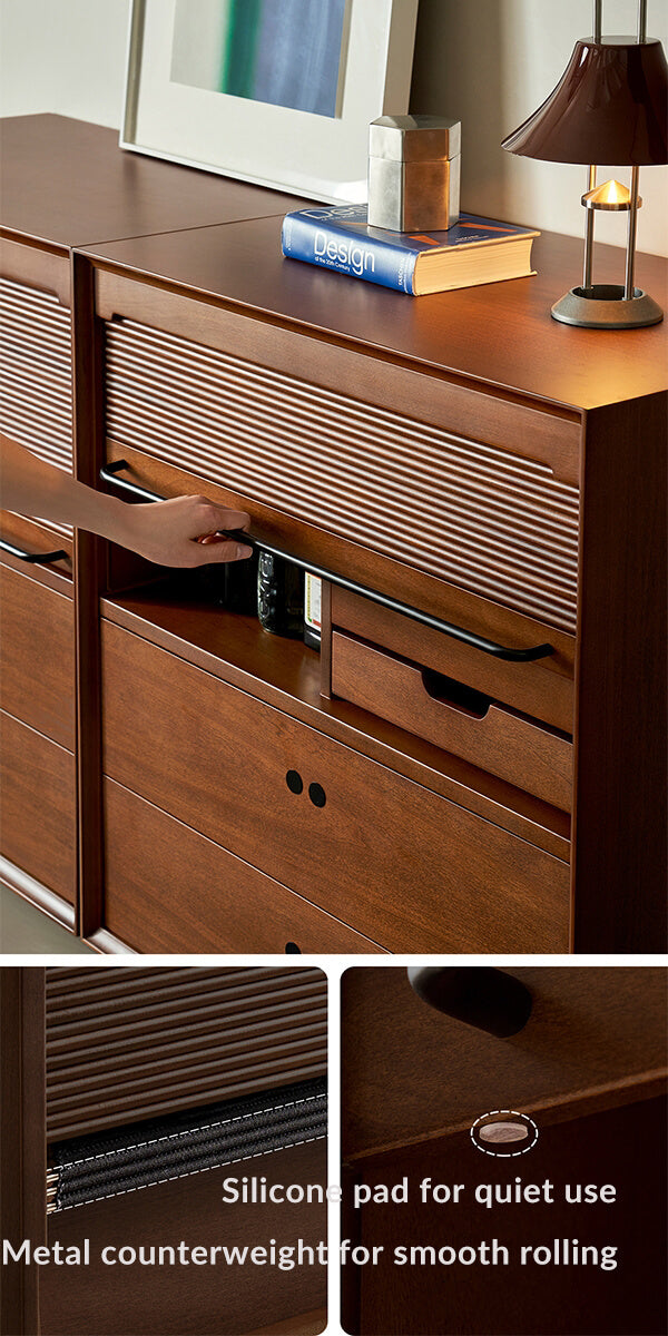 Tambour cabinet showing roll-top door, metal hardware and silent drawer pads
