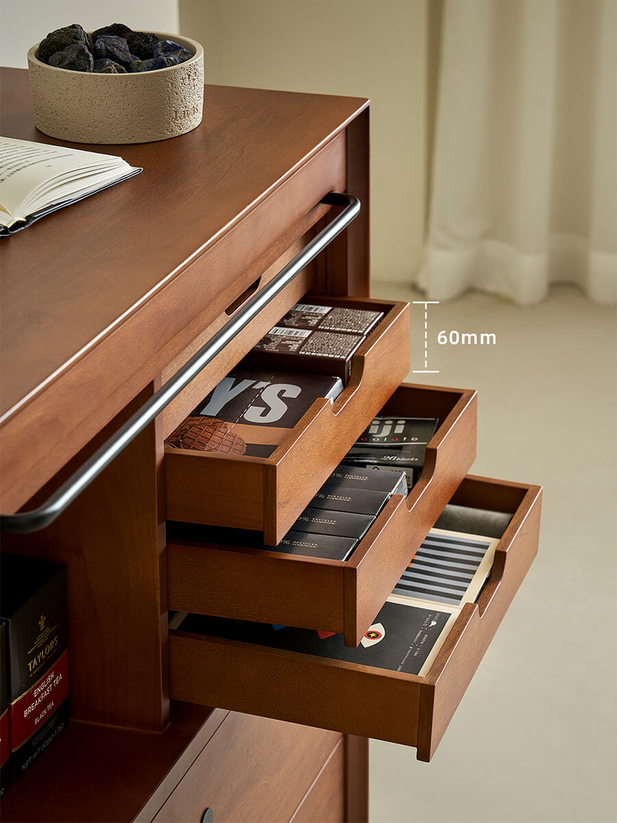 Tambour cabinet showing shallow and deep drawers for organised storage