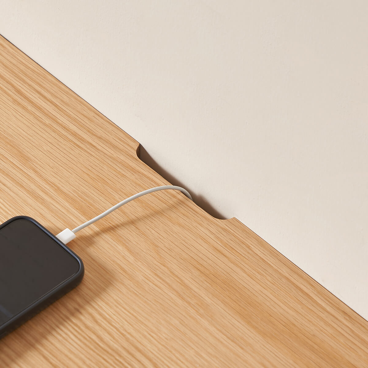 Toren solid oak TV unit with discreet cable management cut-out on the tabletop