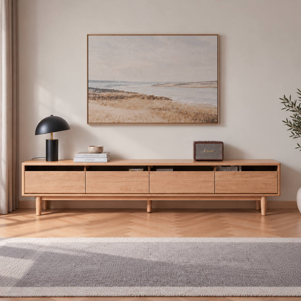 Toren solid oak TV unit in natural oak, styled in a Scandinavian living room