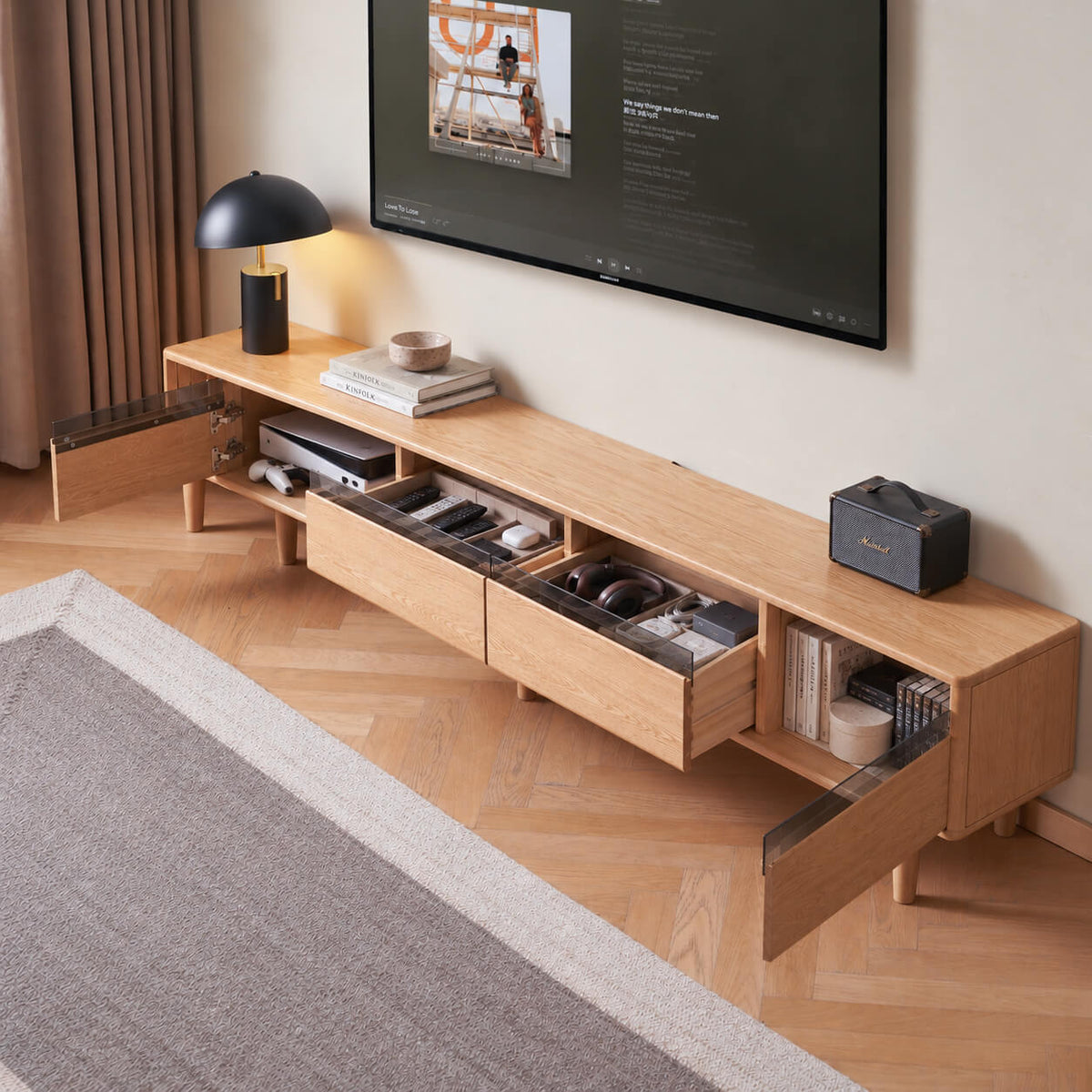 Toren solid oak TV unit with open drawers and cabinets showing spacious storage