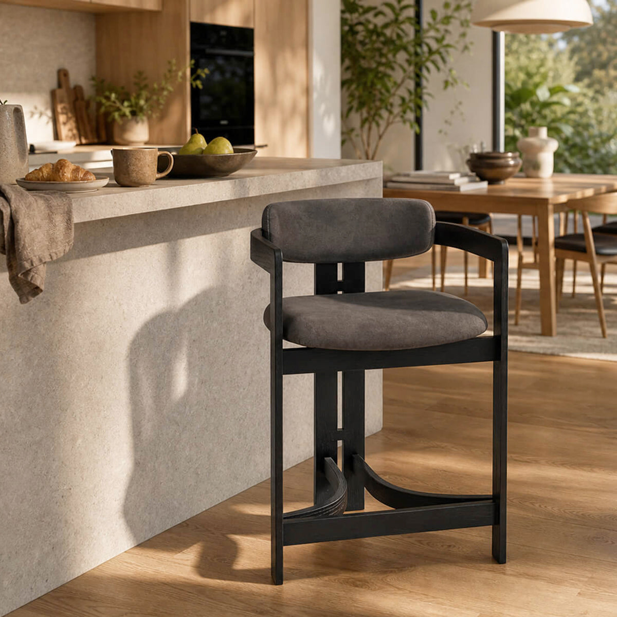 Tritt Bar Stool with black timber frame and grey upholstered seat