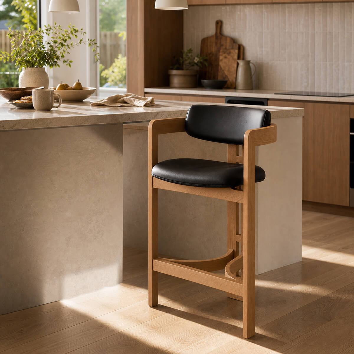 Tritt Bar Stool with natural timber frame and black upholstered seat