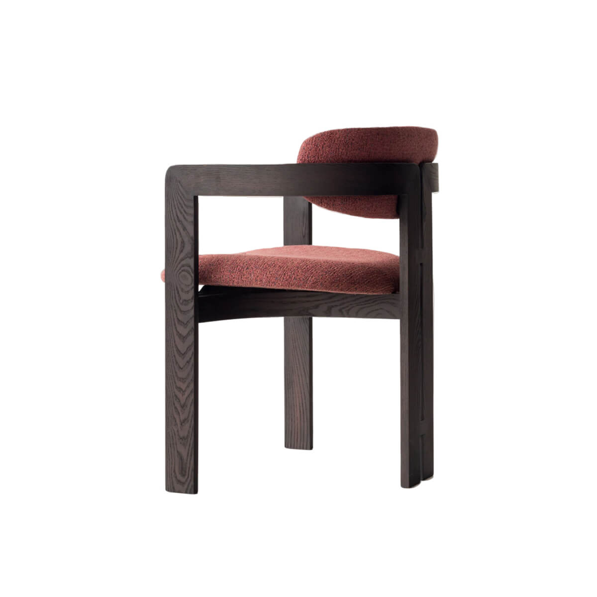 Angled view of Tritt dining chair with black timber frame and red fabric upholstery