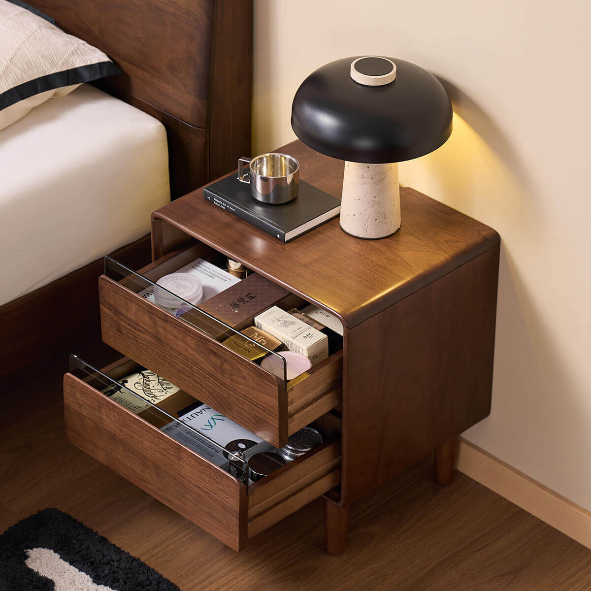 Tura solid walnut bedside table with fully extended soft-close drawers