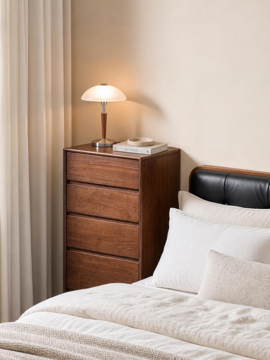 Tura Solid Walnut Chest of 5 Drawers (Tall) in a bedroom