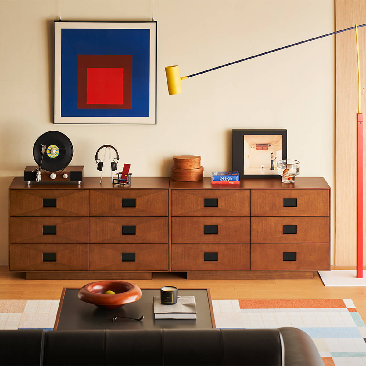 two Gentle 9 Drawer Chest of Drawers in a modern living room