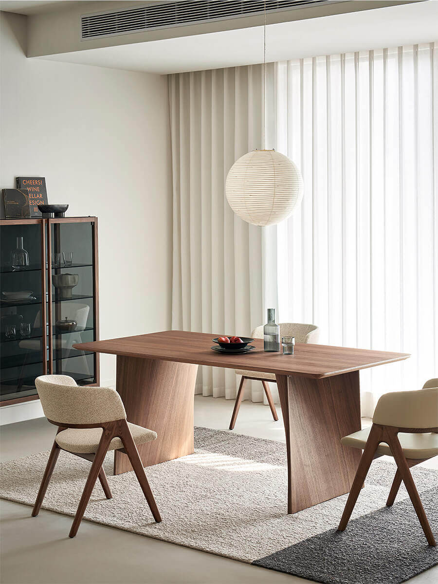Modern walnut veneer dining table with matching dining chairs