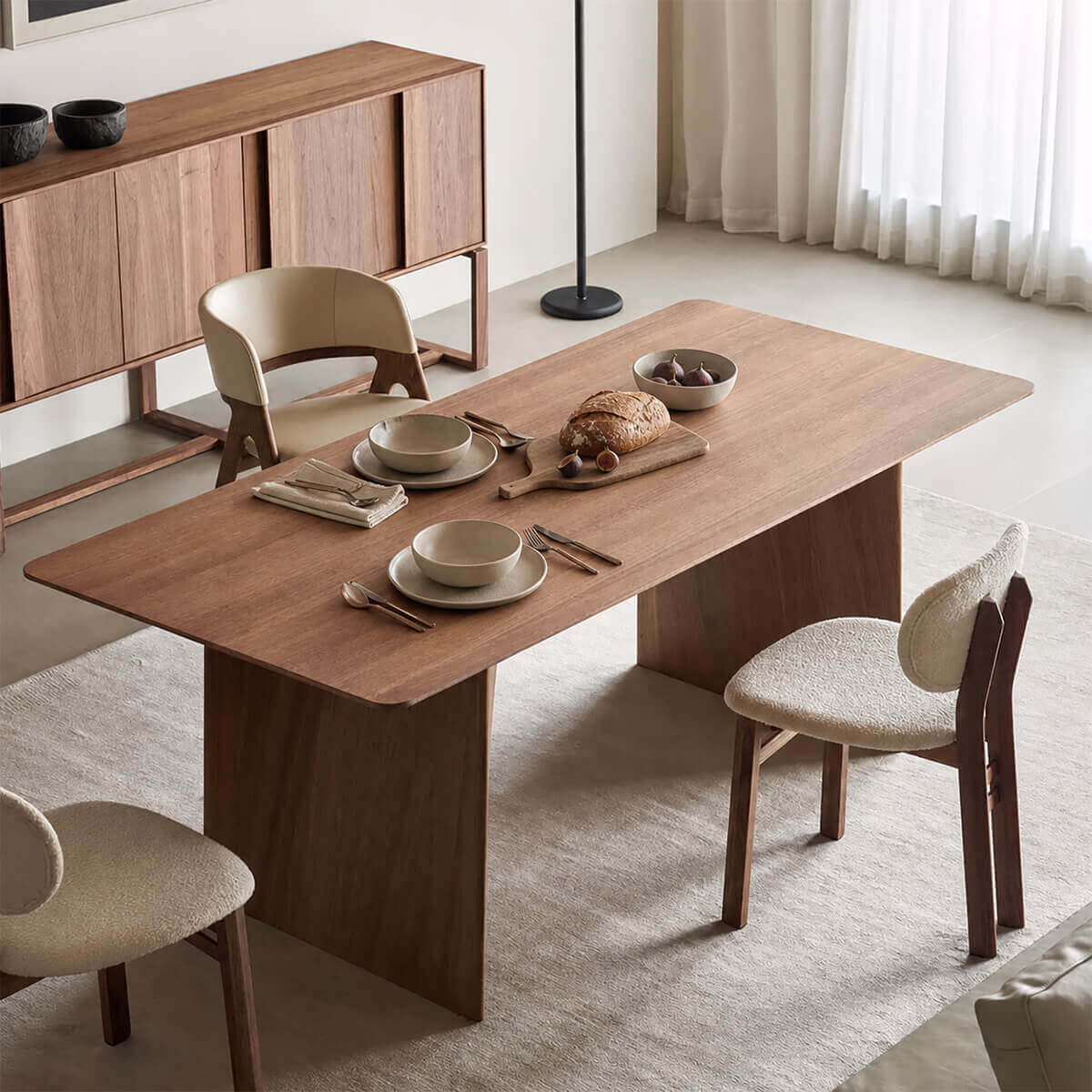 Vertex dining table styled in a contemporary dining room