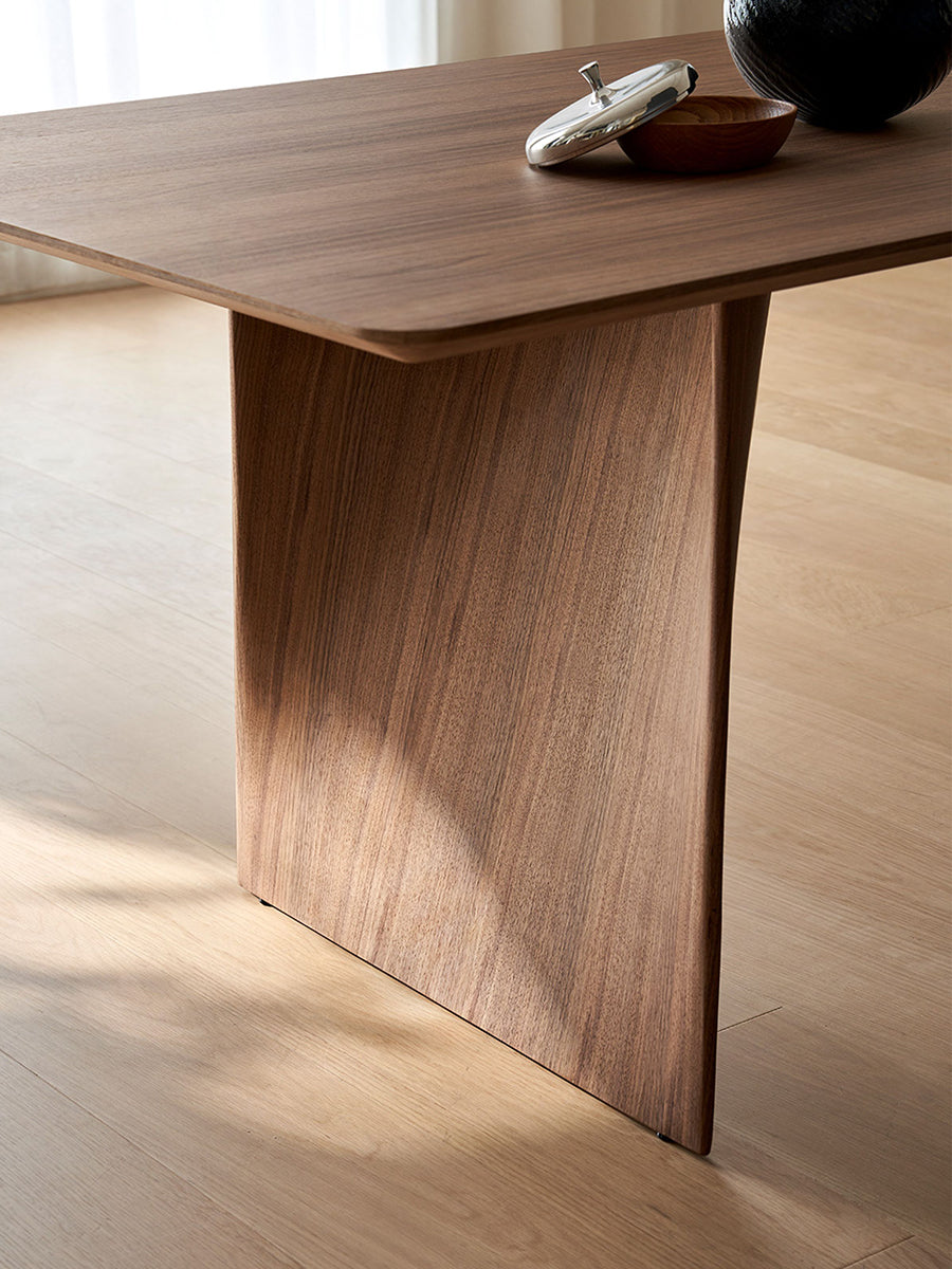 Walnut veneer leg on Vertex dining table