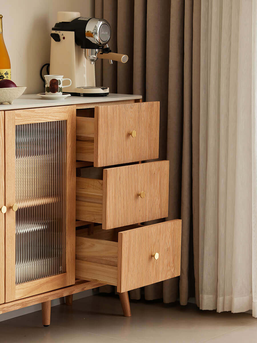 Voss solid oak sideboard with three drawers open, showing the internal drawer storage.