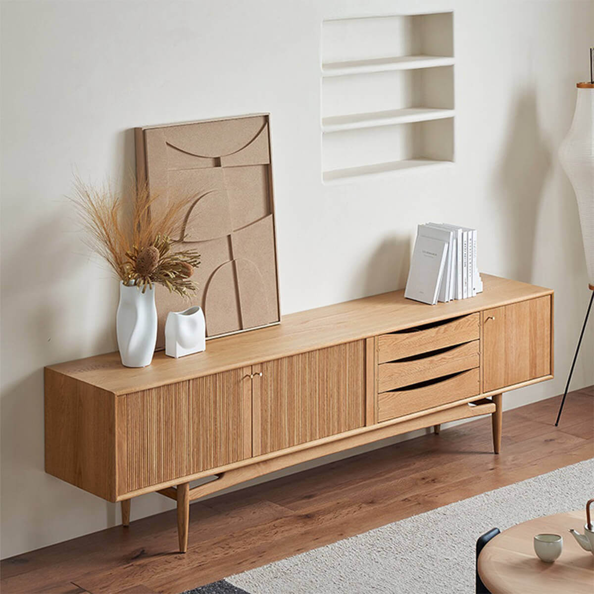 Wave TV Unit in natural oak finish styled in a modern living room