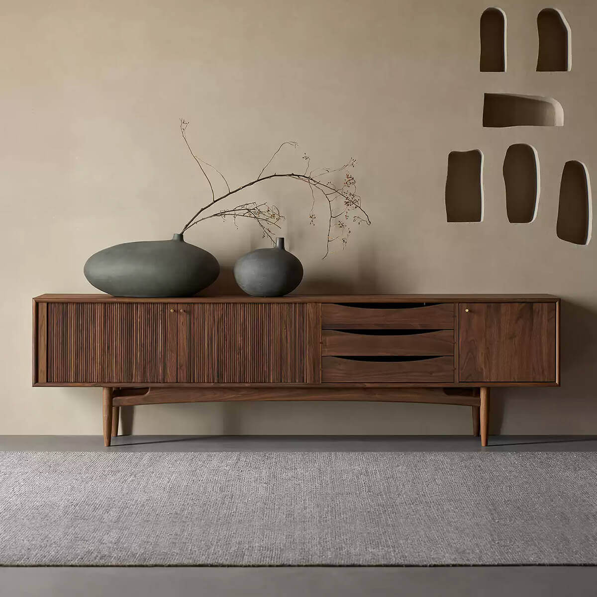 Wave TV Unit in walnut finish styled in a contemporary living room