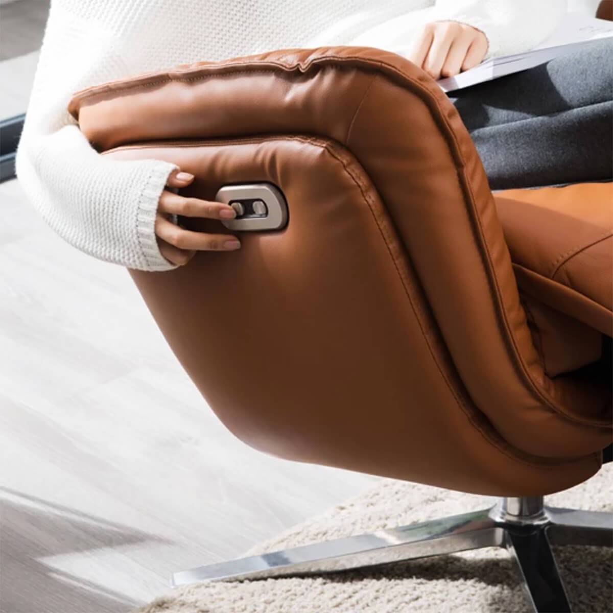 Image of a person operating a copenhagen electric recliner