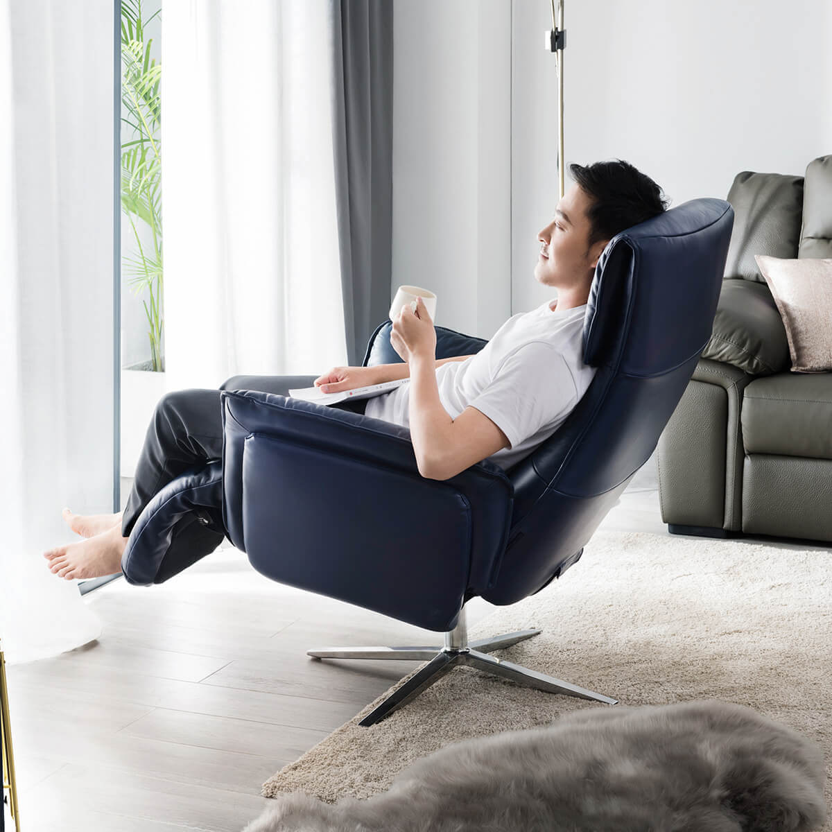 Image of a blue copenhagen electric recliner