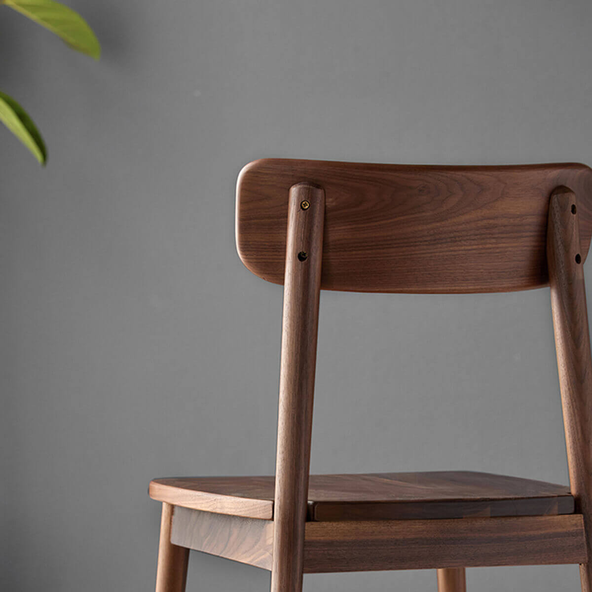 Bond Dining Chair curved solid walnut backrest and rear joinery