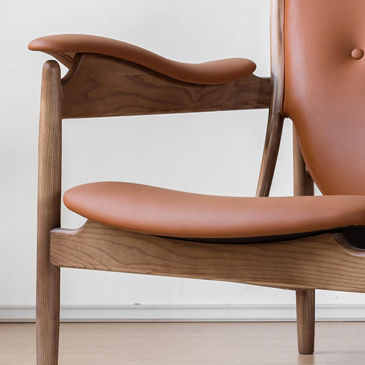 Close-up of solid wood craftsmanship on Chieftain chair replica