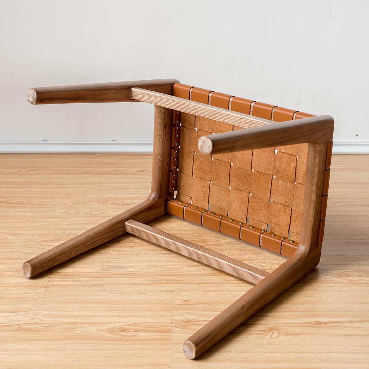 Underside construction of the Connar solid ash saddle leather stool