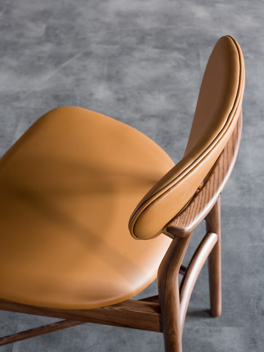 Floating backrest detail of the Ellyn solid ash dining chair