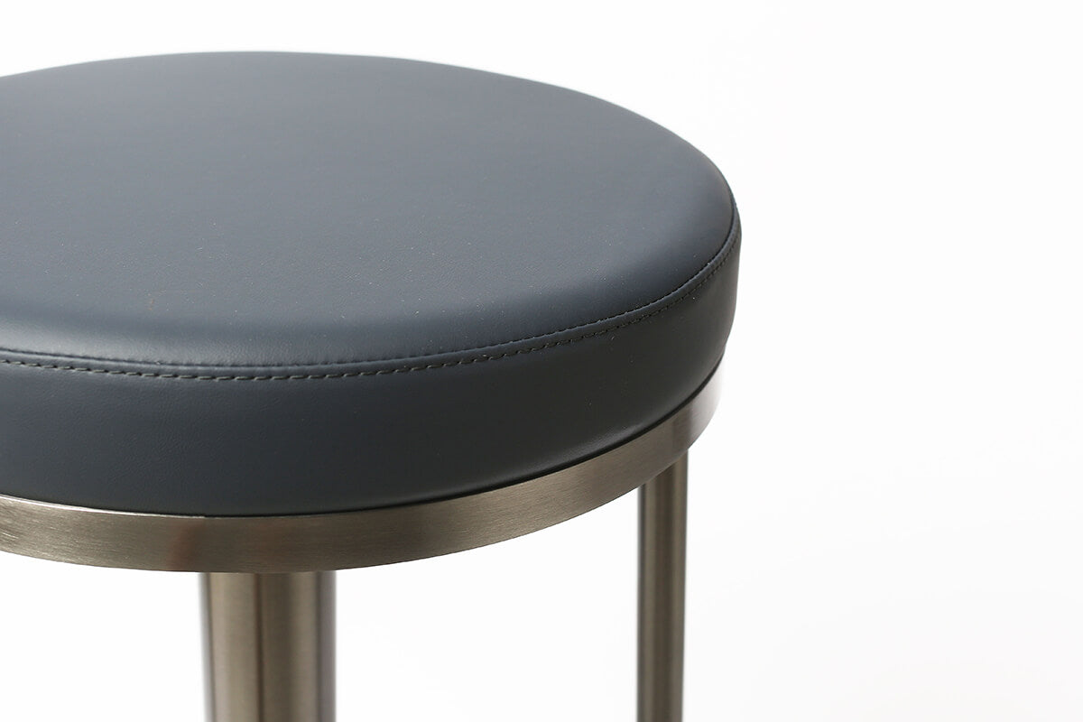 Close-up of Jason bar stool seat upholstery and stitching