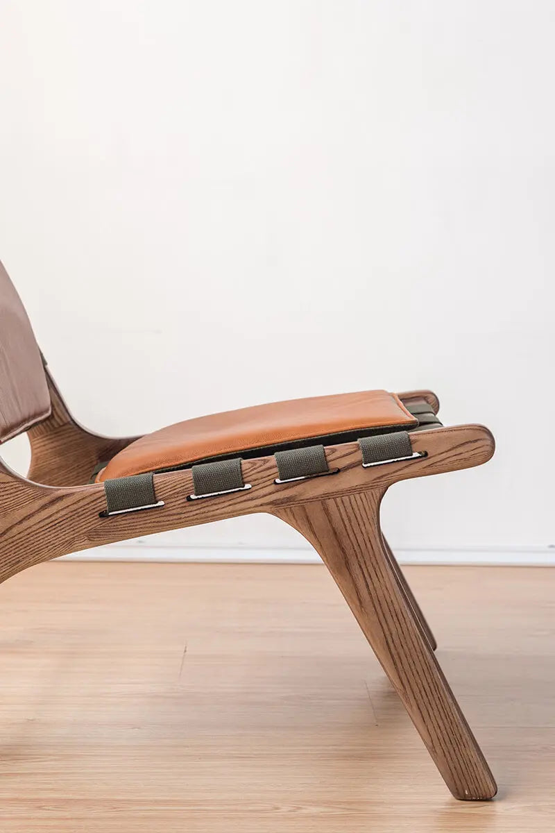 Julian Saddle Chair Z-furnishingSolid American ash wood frame and woven canvas support detail on the Julian Armchair