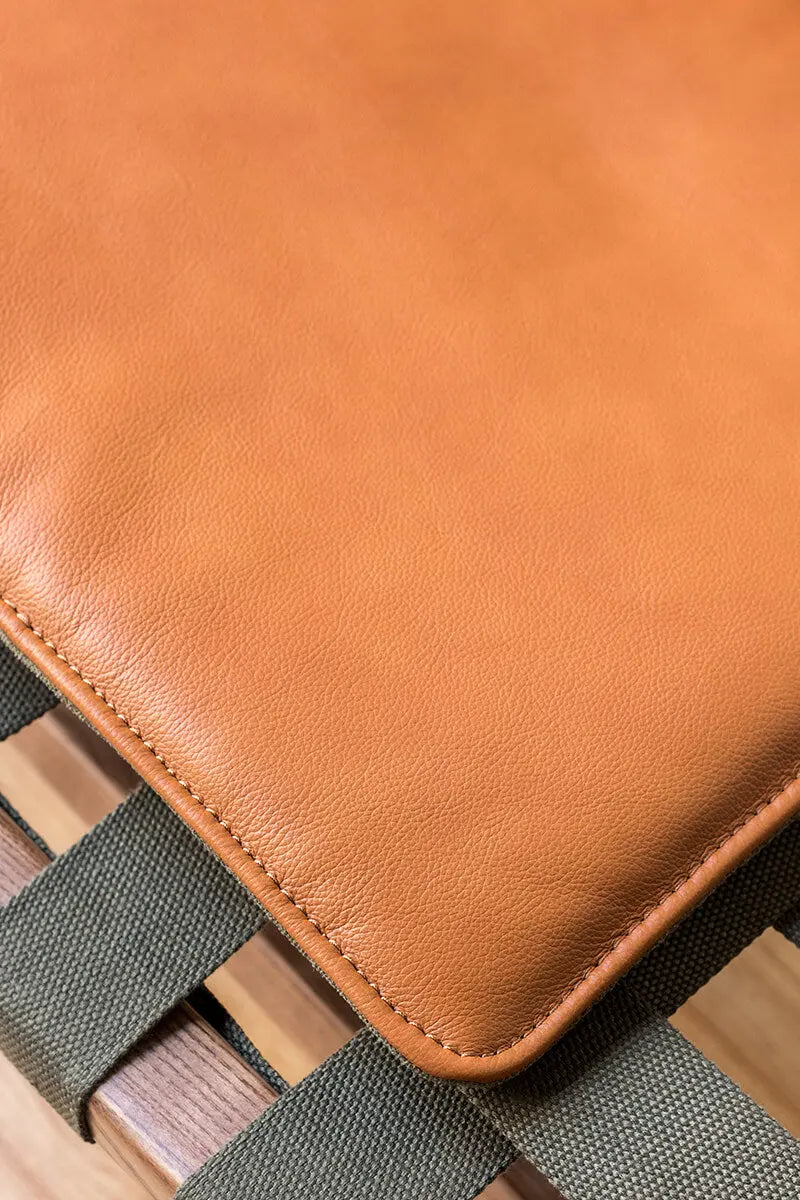 Close-up detail of the genuine leather cushion on the Julian Armchair
