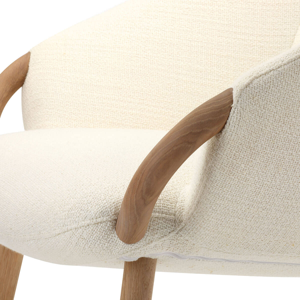 Close-up of the solid oak arm detail on the KEBE Link Wood armchair