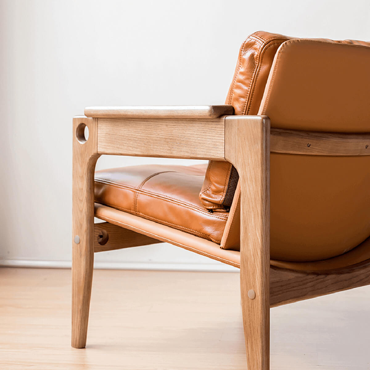 Detail of solid ash wood frame on Lapland armchair