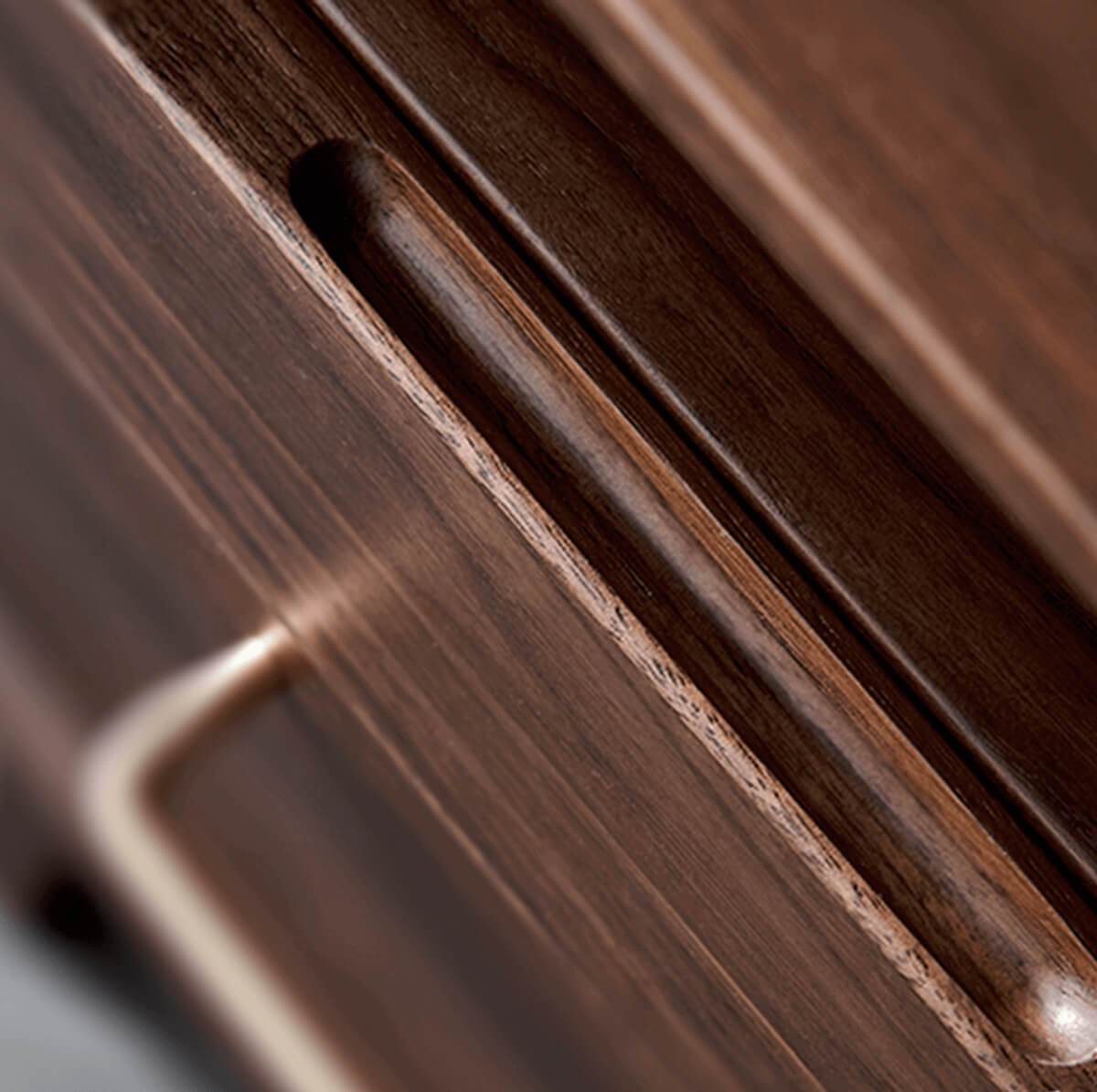 Brass handle detail on Luxembourg solid walnut bedside table