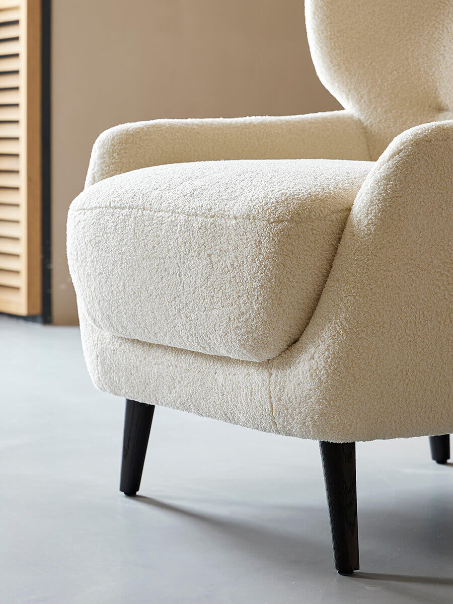 Close-up of Mandy armchair seat cushion and upholstery texture