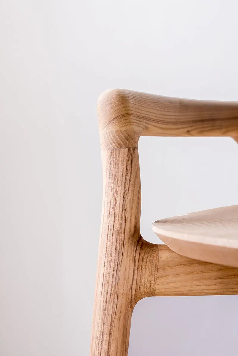 Close-up of Mountain timber bar stool backrest and wood grain detail