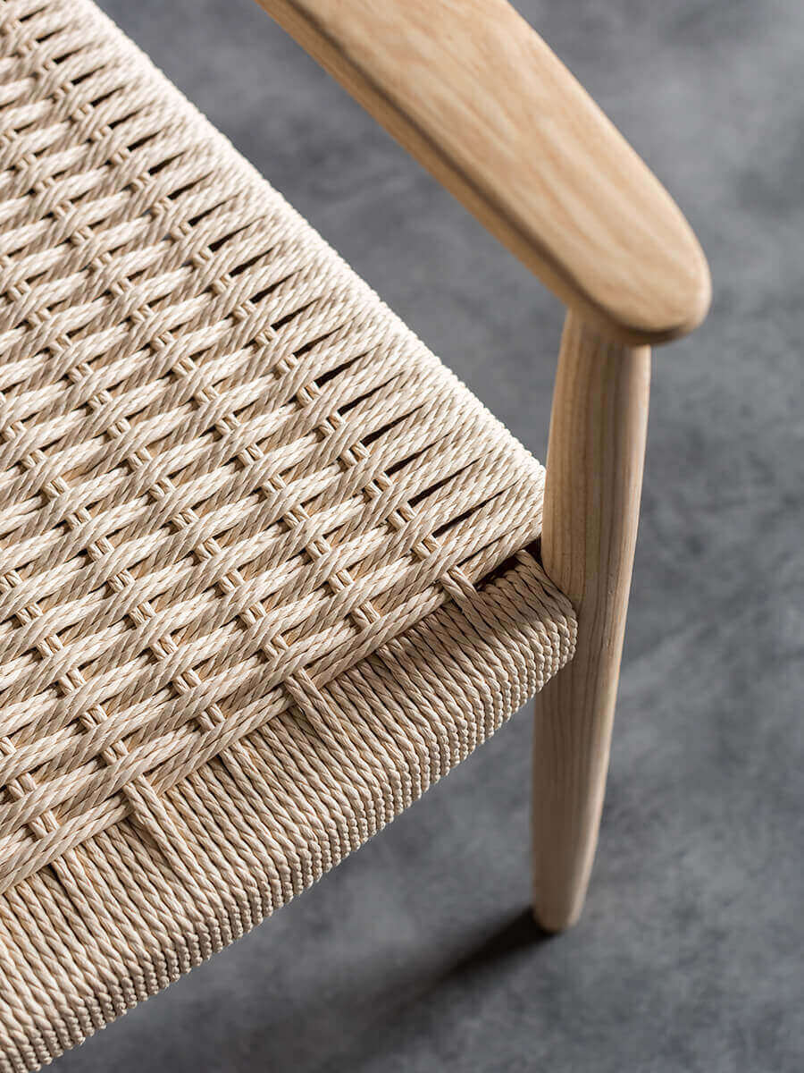 Handwoven paper cord seat detail of the Lancer dining chair